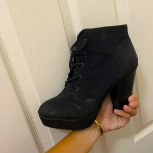 Black heeled lace up booties
